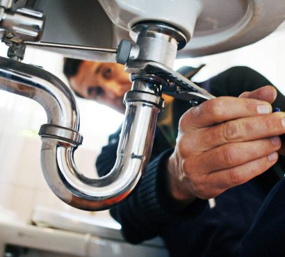 close-up-of-plumber-repairing-sink-with-tool-in-ba-2025-02-04-02-12-53-9XBKELG.jpg